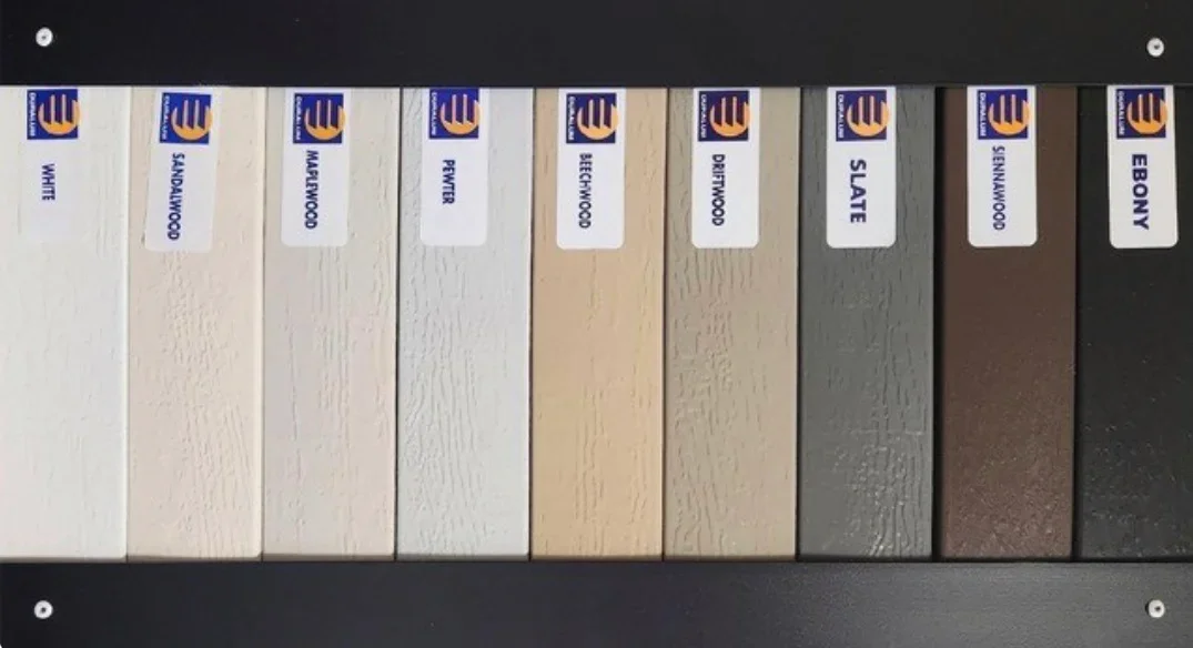 Nine hardwood finish samples from white to ebony, labeled with stain names and company branding